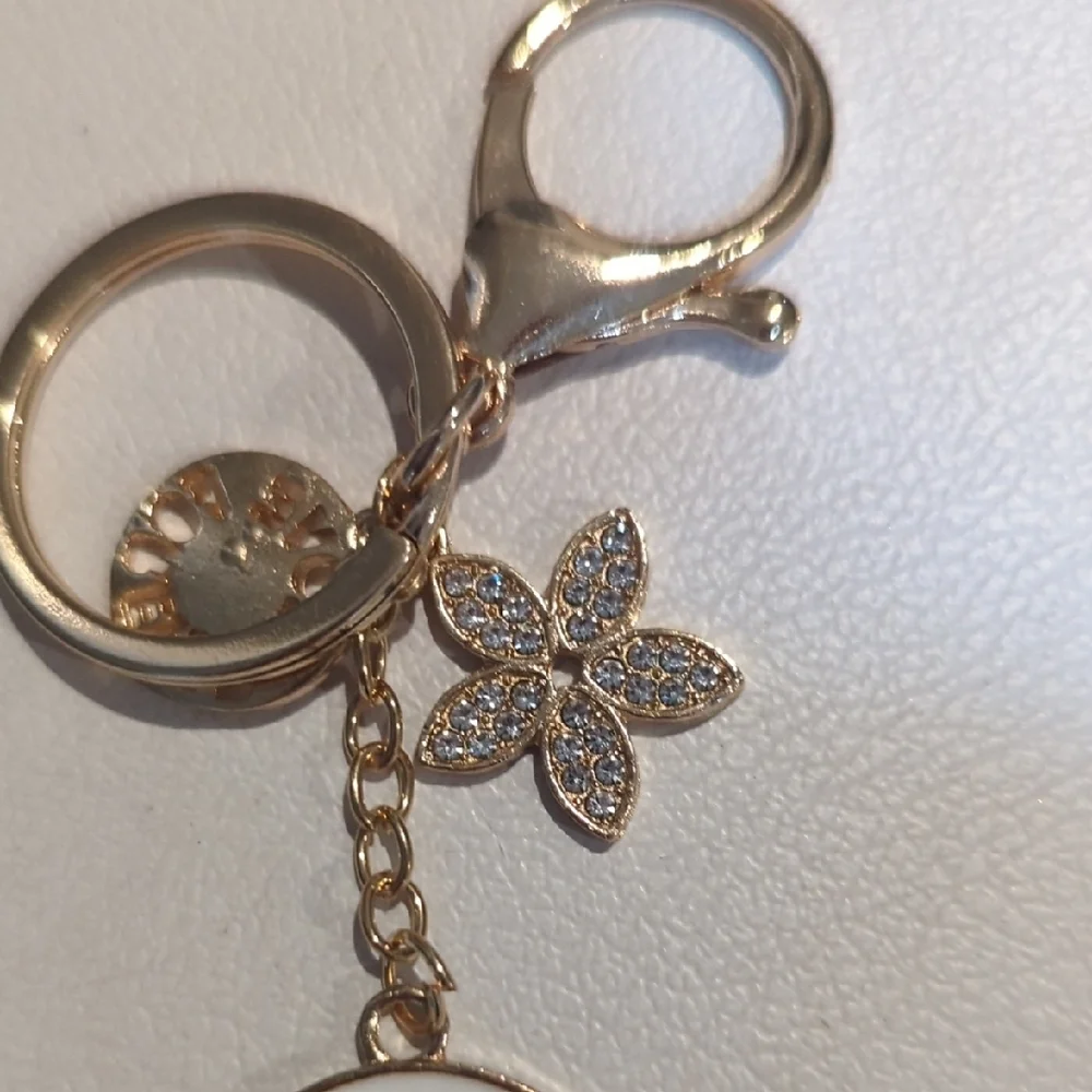 Elegant Gold Keychain with Floral Charm